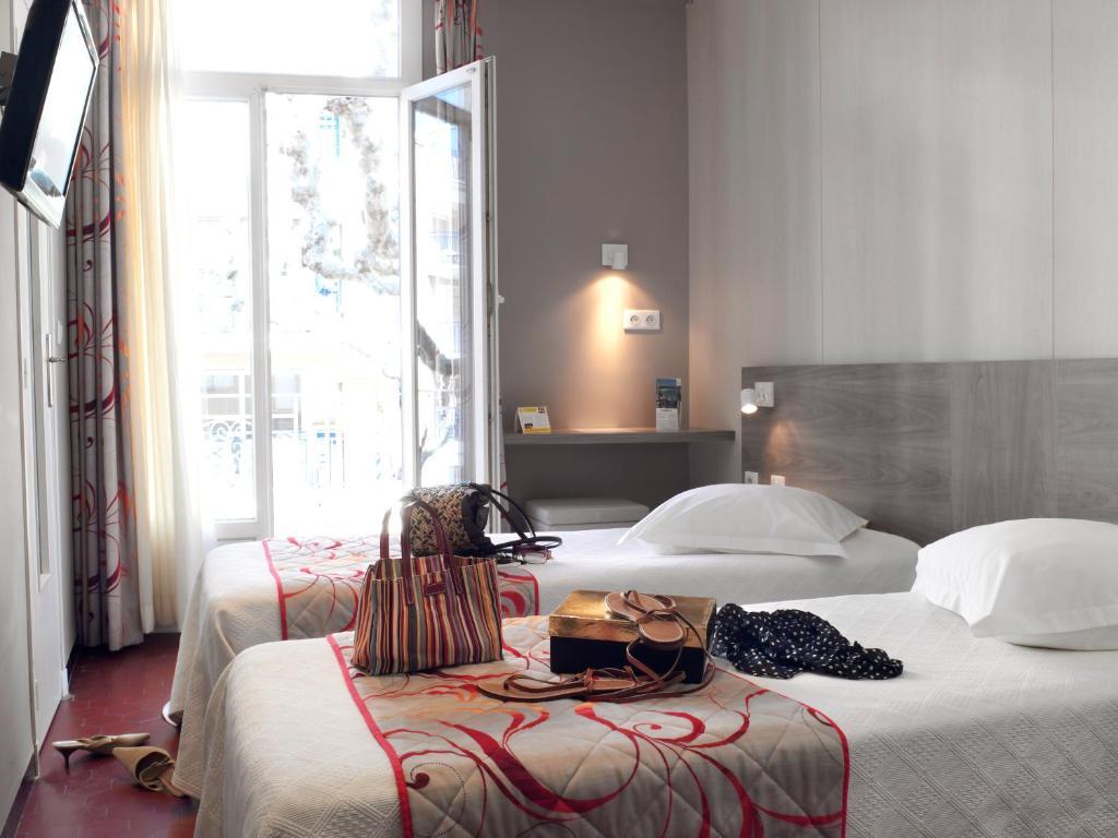 Brit Hotel Confort Le Revest Sainte-Maxime Camera foto